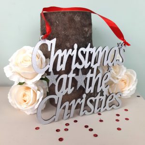 slvr-chrstmsfmly-nmsgn